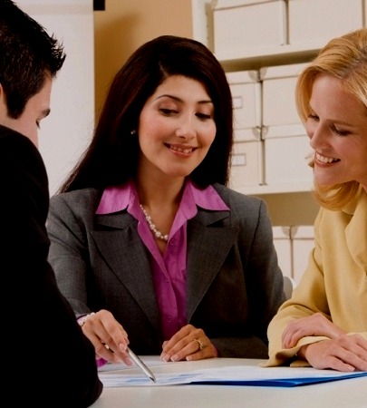 Jeweller's client receiving a jewellery valuation report